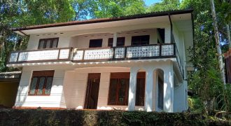 One acres land & simple two story house for sale in Lakshapana Hatton