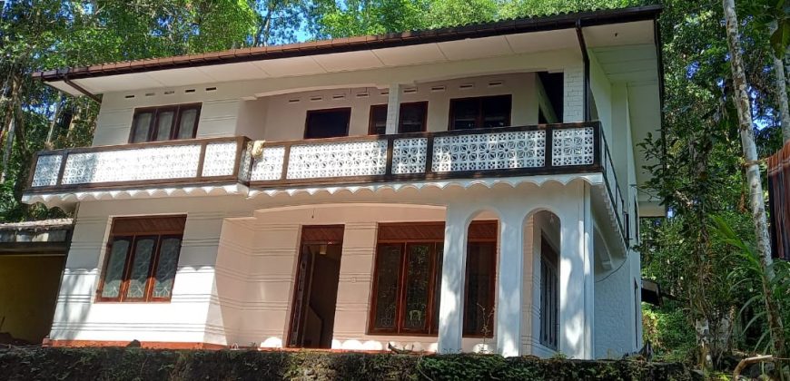 One acres land & simple two story house for sale in Lakshapana Hatton